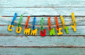 Sting with pegs. Spelling out the word Community.